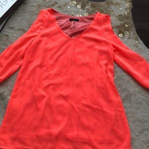 Bright orange tunic/top